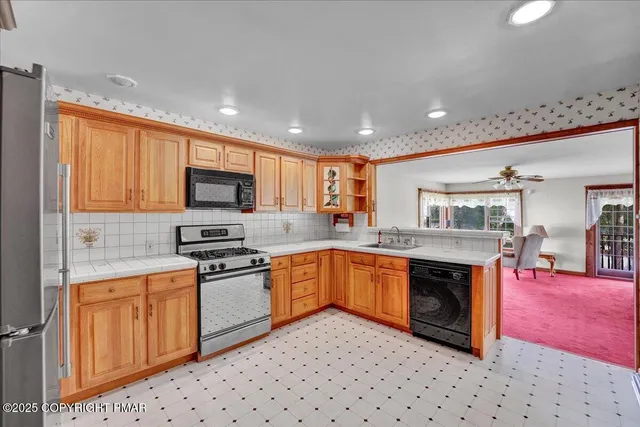 a bedroom with a bed and cabinets