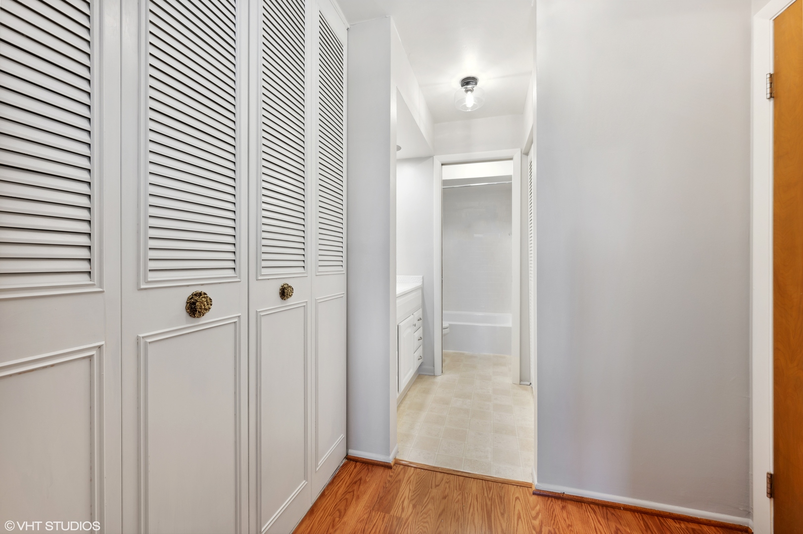 250 Ridge Avenue, Unit 5F Evanston, IL 60202 - Photo 15 of 19 a view of a hallway with wooden floor