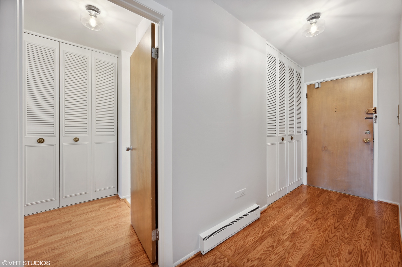 250 Ridge Avenue, Unit 5F Evanston, IL 60202 - Photo 2 of 19 a view of hallway with wooden floor