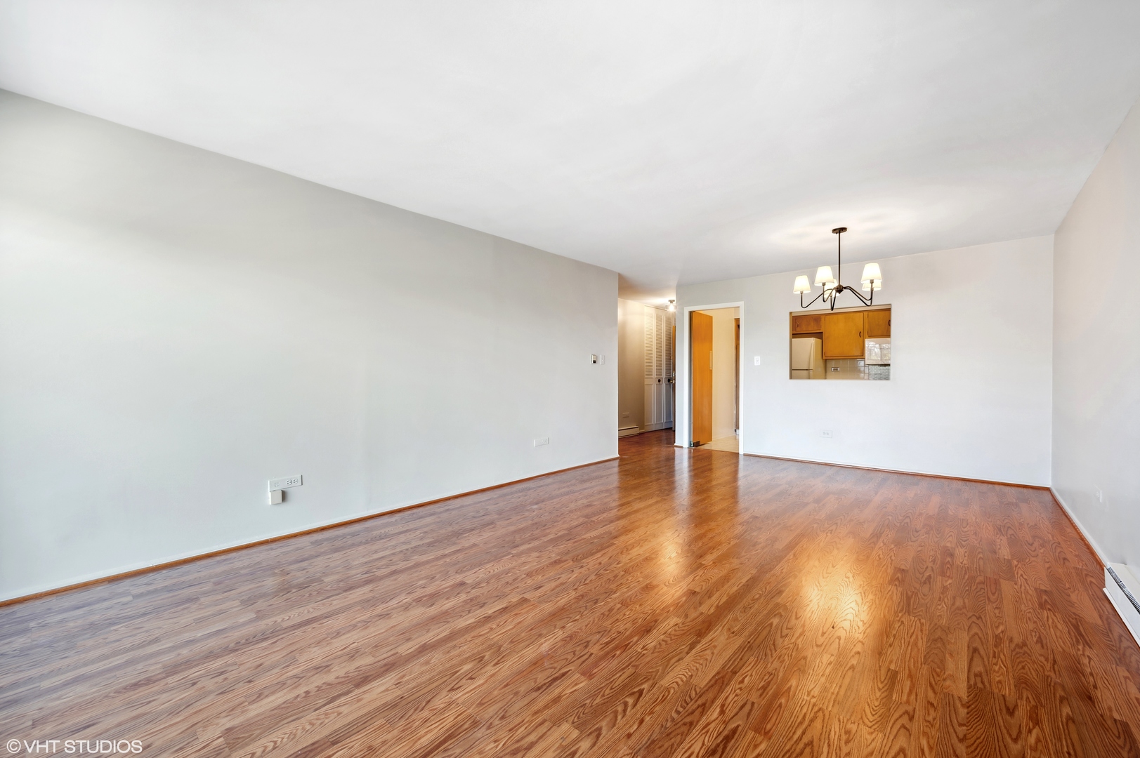 250 Ridge Avenue, Unit 5F Evanston, IL 60202 - Photo 6 of 19 a view of empty room with wooden floor