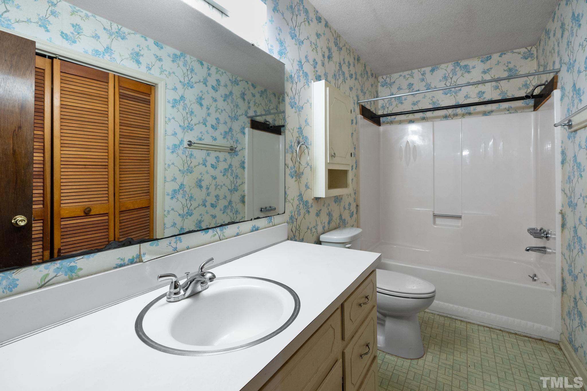5930 Guess Road Durham, NC 27712 - Photo 27 of 43 a bathroom with a sink toilet and shower