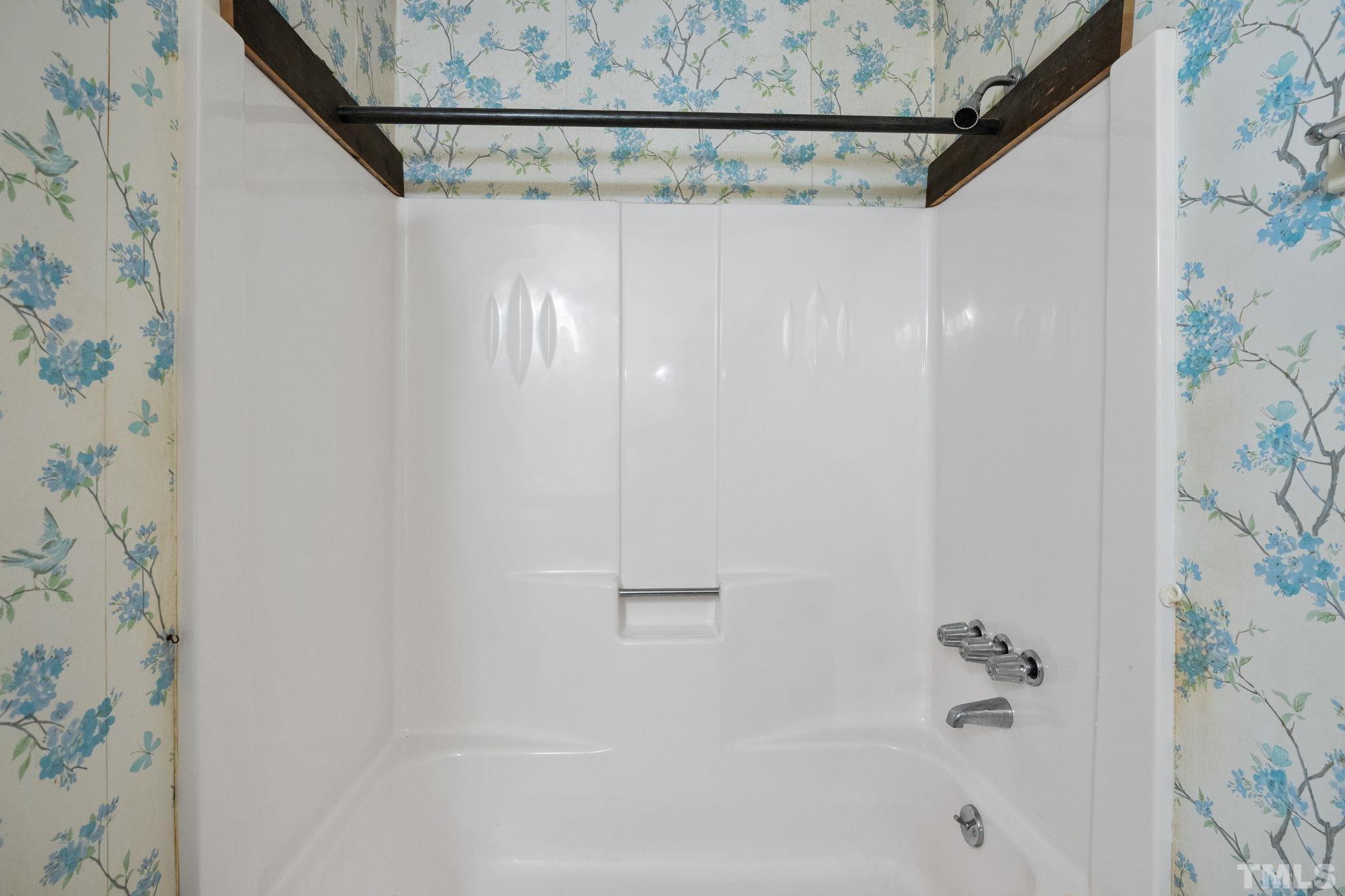 5930 Guess Road Durham, NC 27712 - Photo 29 of 43 a bathroom with a shower curtain