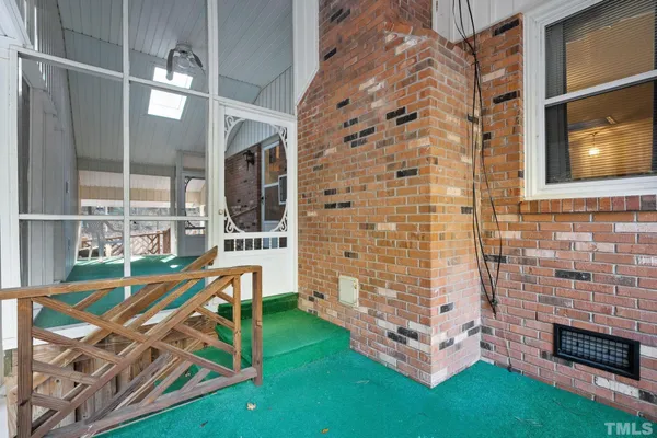 a view of roof deck with furniture