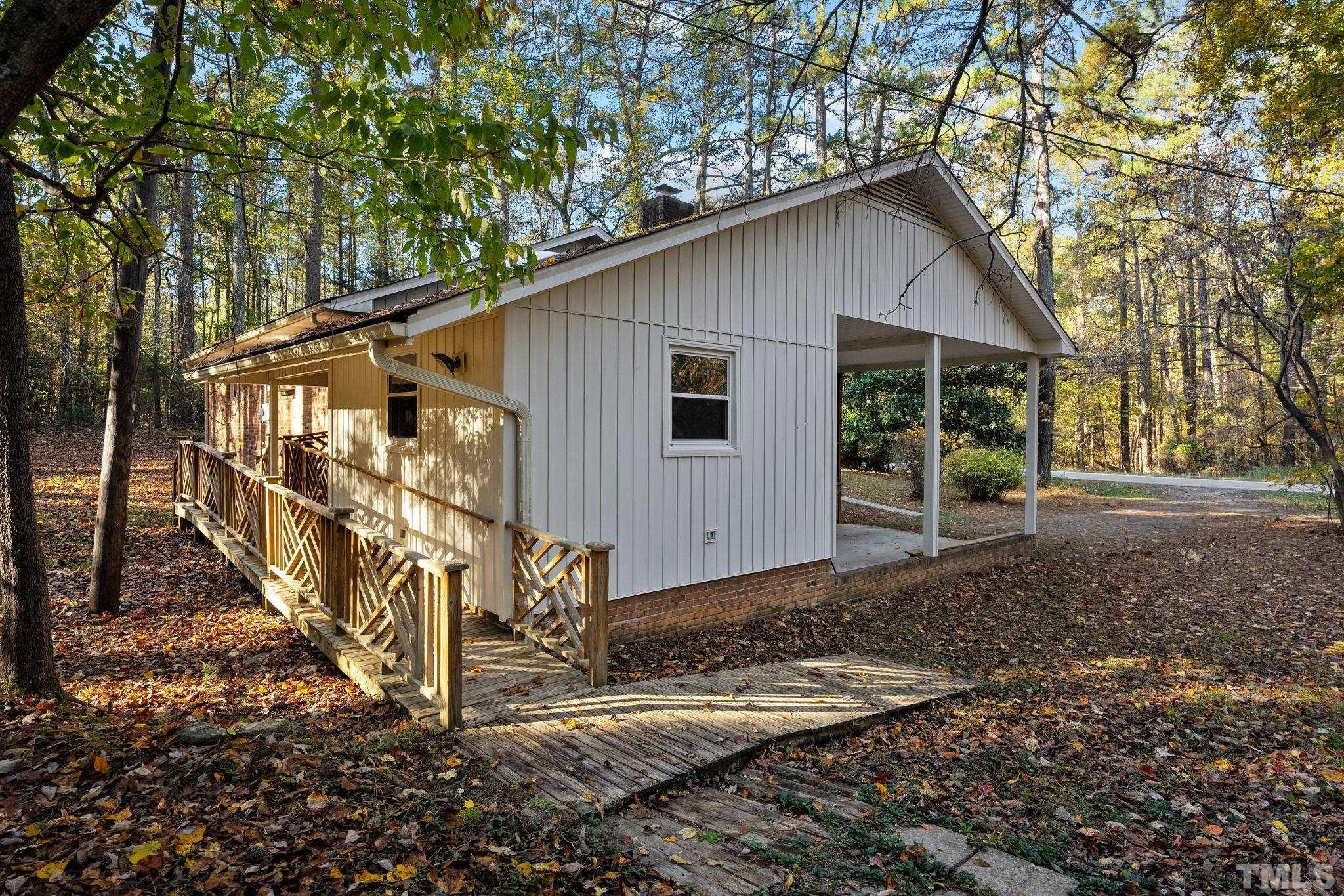 5930 Guess Road Durham, NC 27712 - Photo 37 of 43 a view of a house with a yard