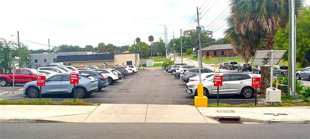 94 Southwest Fort King Street Ocala, FL 34471 - Photo 1 of 8 a view of parking with cars