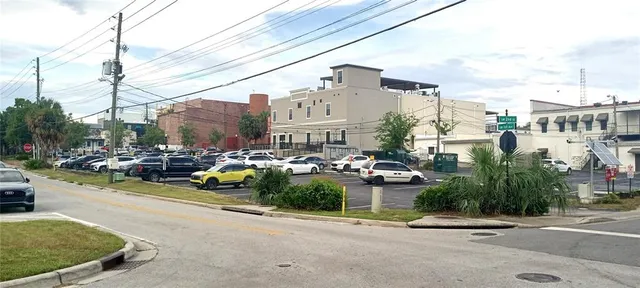 a view of a street with cars