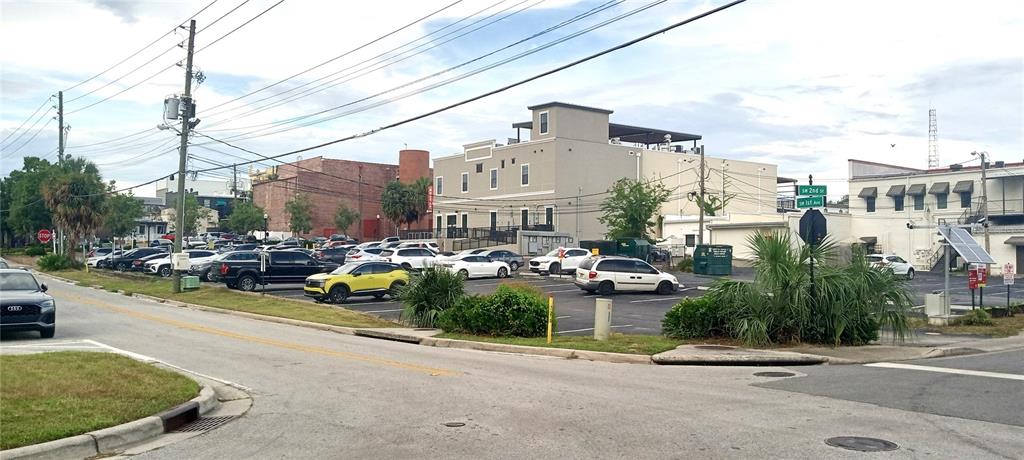 94 Southwest Fort King Street Ocala, FL 34471 - Photo 3 of 8 a view of a street with cars