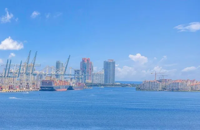 a view of a city with tall buildings