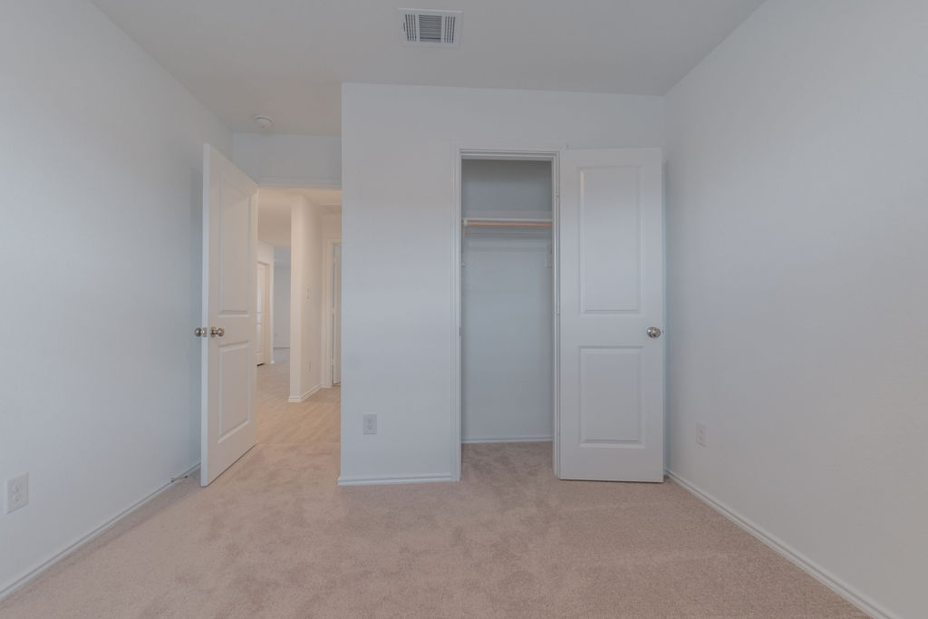 216 Little Sparklers Loop Hutto, TX 78634 - Photo 16 of 39 a view of an empty room and closet area