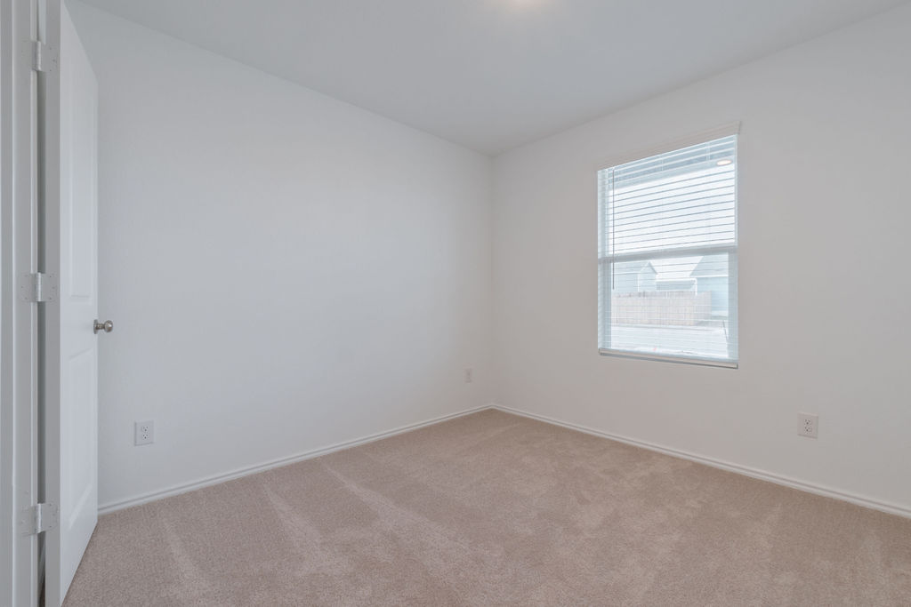 216 Little Sparklers Loop Hutto, TX 78634 - Photo 17 of 39 an empty room with a window