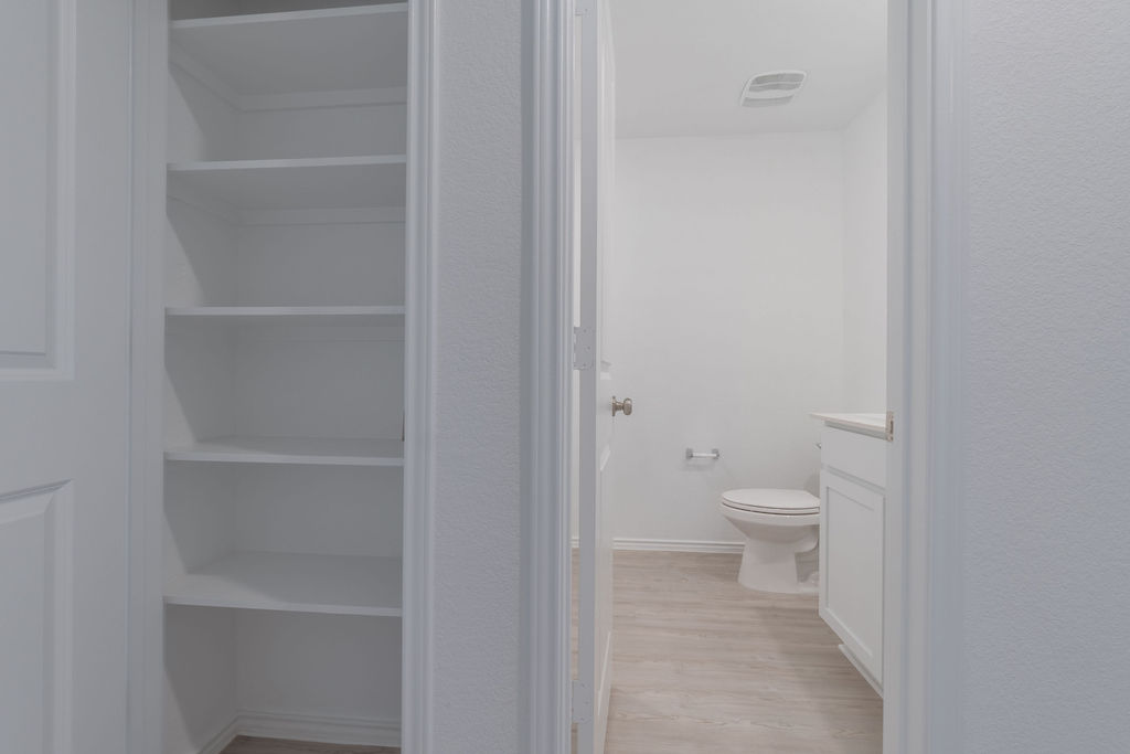 216 Little Sparklers Loop Hutto, TX 78634 - Photo 20 of 39 a bathroom with a toilet