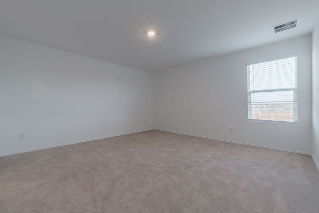 216 Little Sparklers Loop Hutto, TX 78634 - Photo 28 of 39 an empty room with a window