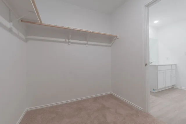 a bathroom with a sink a mirror and a bathtub