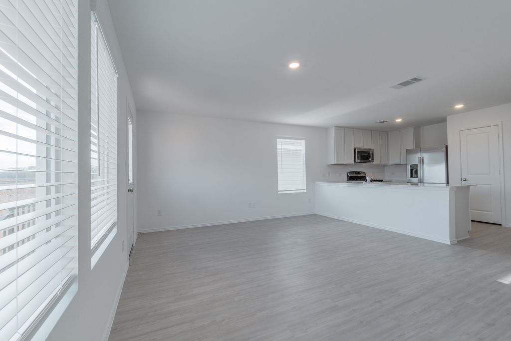 216 Little Sparklers Loop Hutto, TX 78634 - Photo 37 of 39 a view of a kitchen with a sink and cabinets