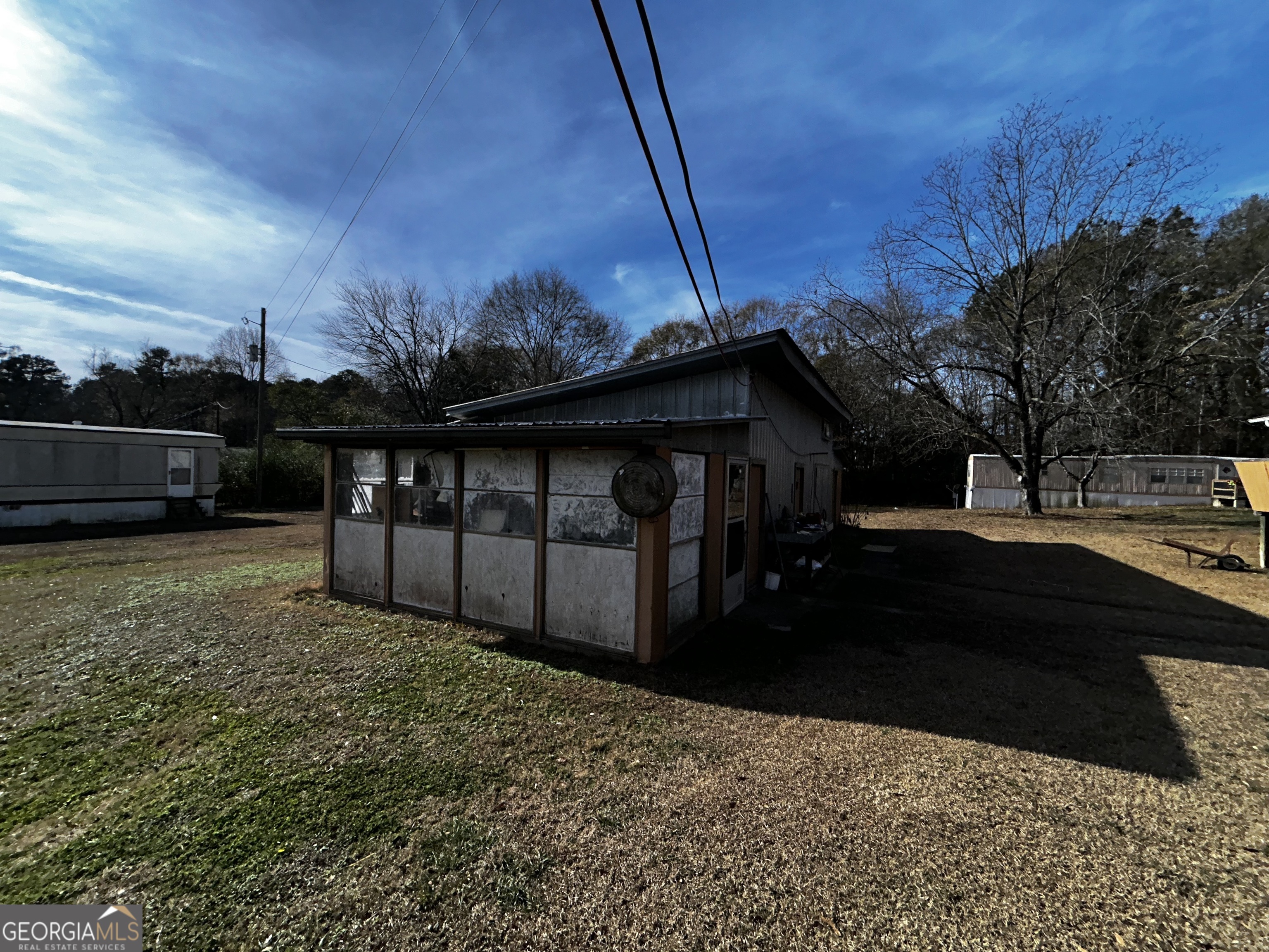 68 White Pine Road Toccoa, GA 30577 - Photo 6 of 11 a view of a house with backyard and sitting area
