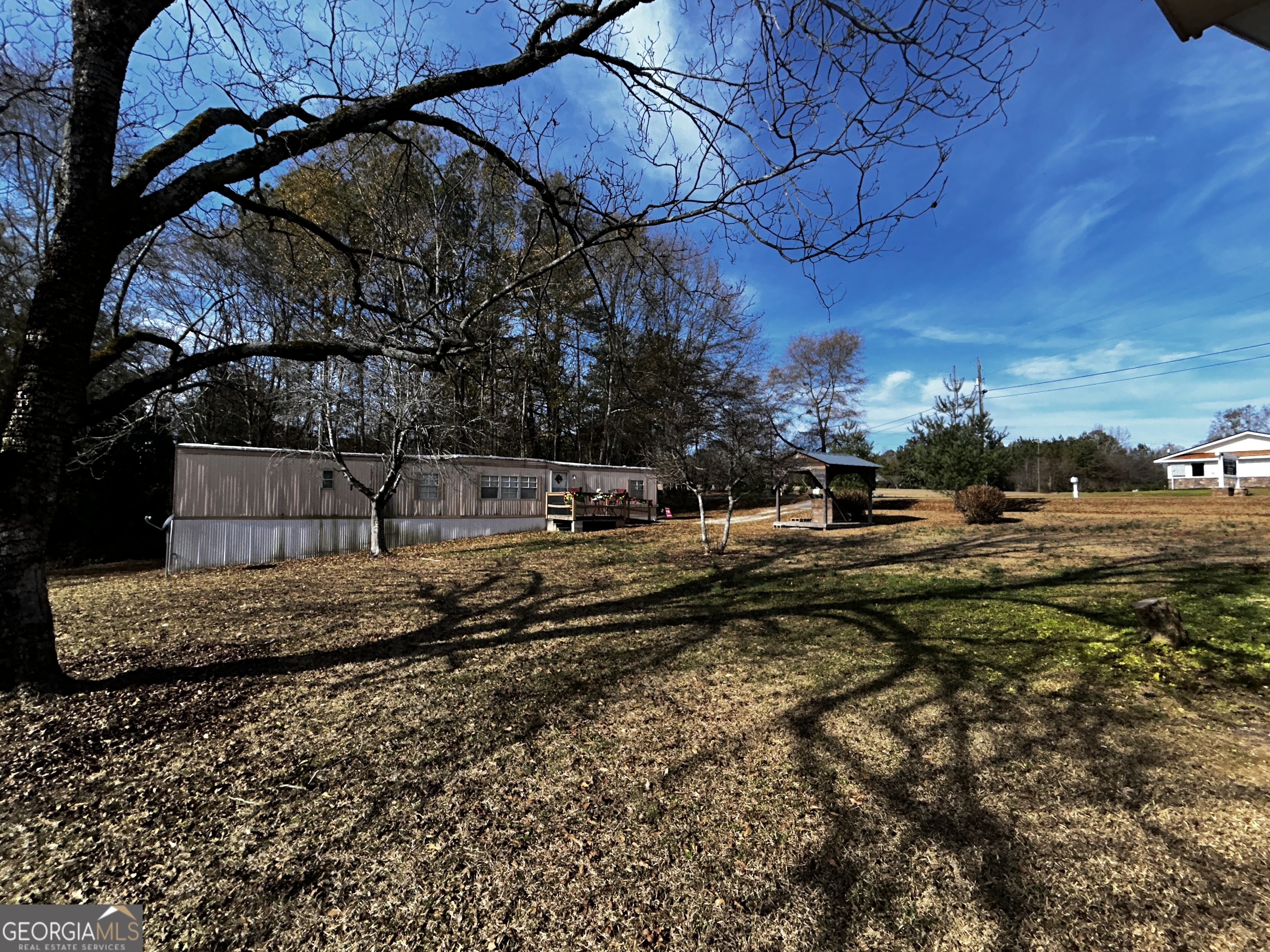 68 White Pine Road Toccoa, GA 30577 - Photo 10 of 11 a view of a yard with an tree