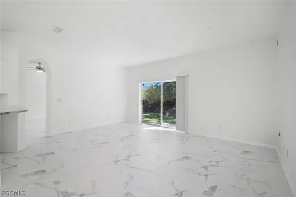 an empty room with windows