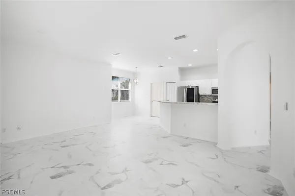 a view of a kitchen with a sink