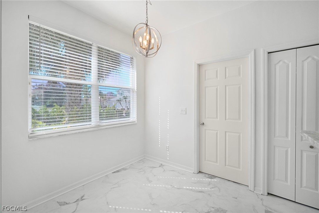 21768 Brixham Run Loop Estero, FL 33928 - Photo 10 of 36 a view of a livingroom with an entryway