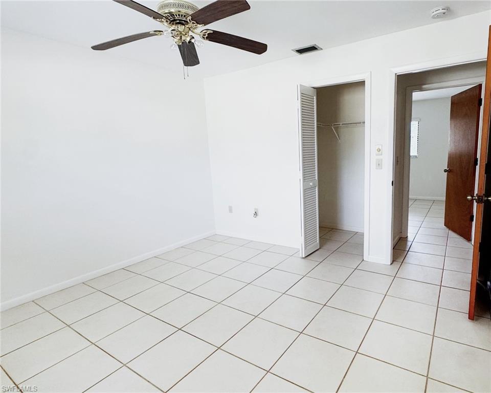 699 110th Avenue North, Unit B Naples, FL 34108 - Photo 17 of 23 a view of a livingroom with closet