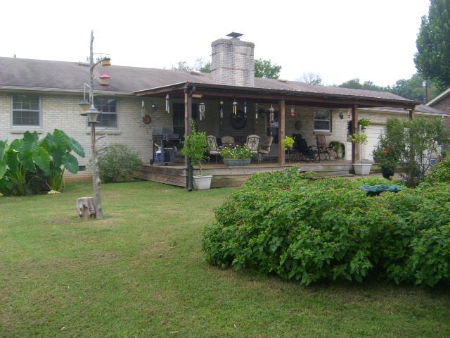 1241 Shawnee Road Madison, TN 37115 - Photo 14 of 15 Lots of mature bushes and trees... Storage bldg also!!