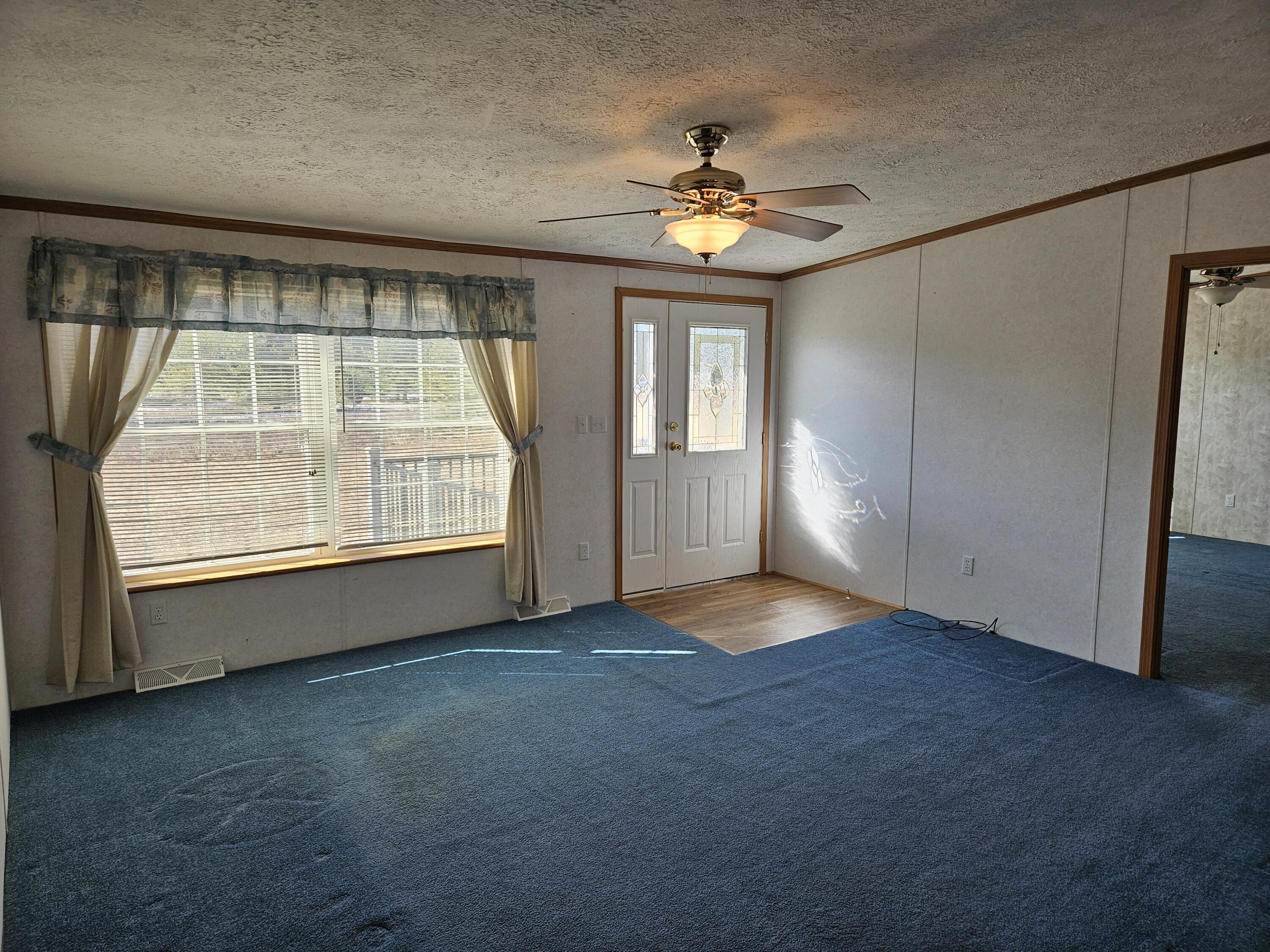 3720 West Fletcher Road Roscommon, MI 48653 - Photo 6 of 51 Front Family Room