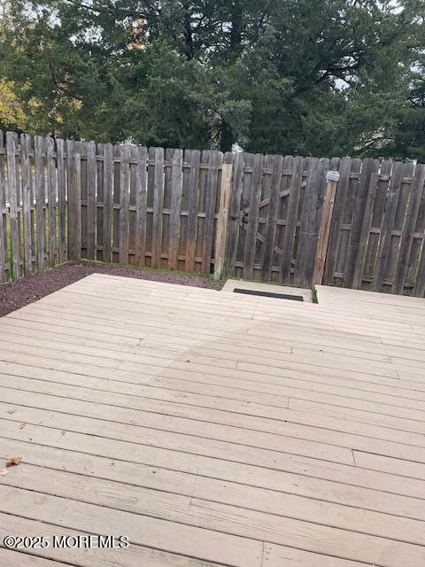 22 Forge Court Jackson, NJ 08527 - Photo 13 of 15 a white house that has wooden fence