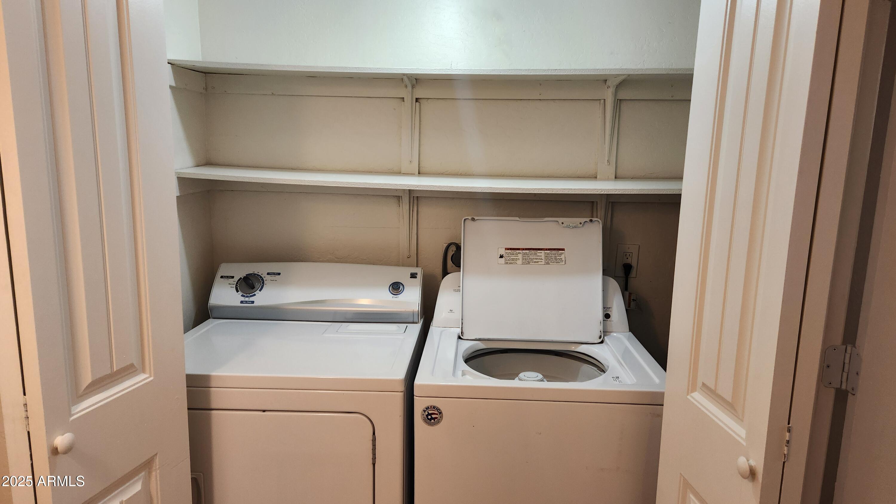 3119 North 38th Street, Unit 10 Phoenix, AZ 85018 - Photo 12 of 20 a utility room with dryer and washer