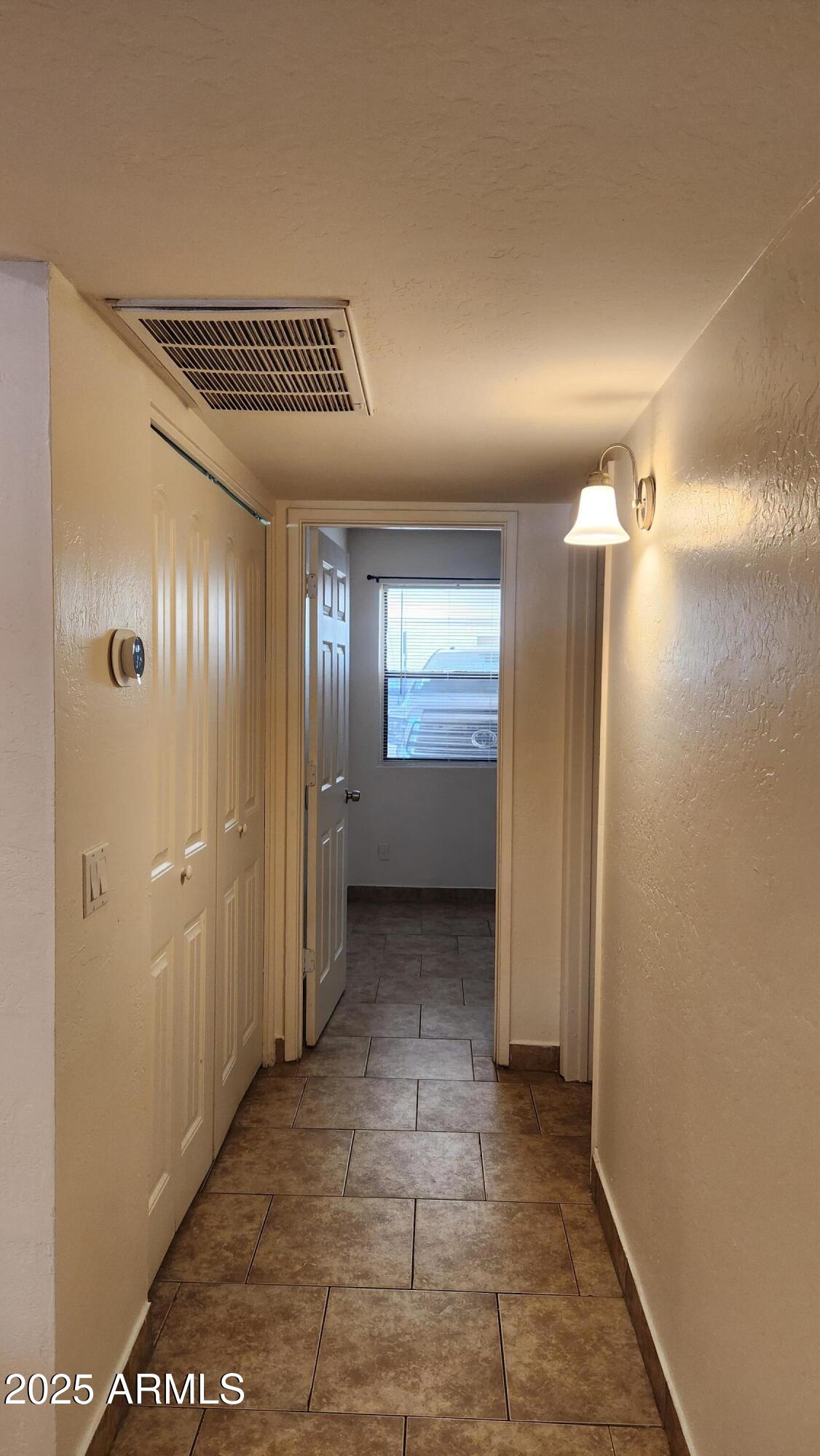 3119 North 38th Street, Unit 10 Phoenix, AZ 85018 - Photo 13 of 20 a view of a hallway