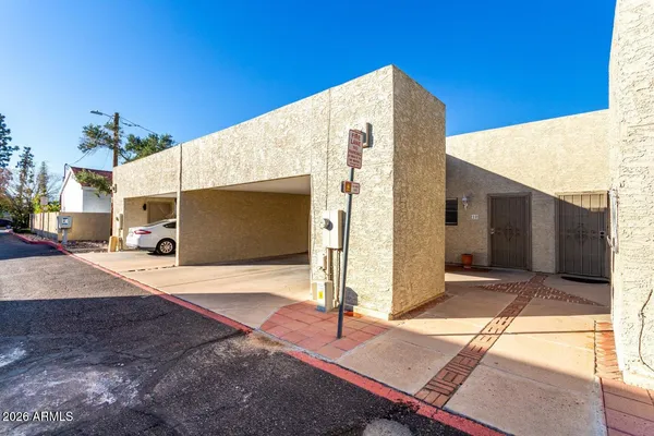a front view of a house with a garage