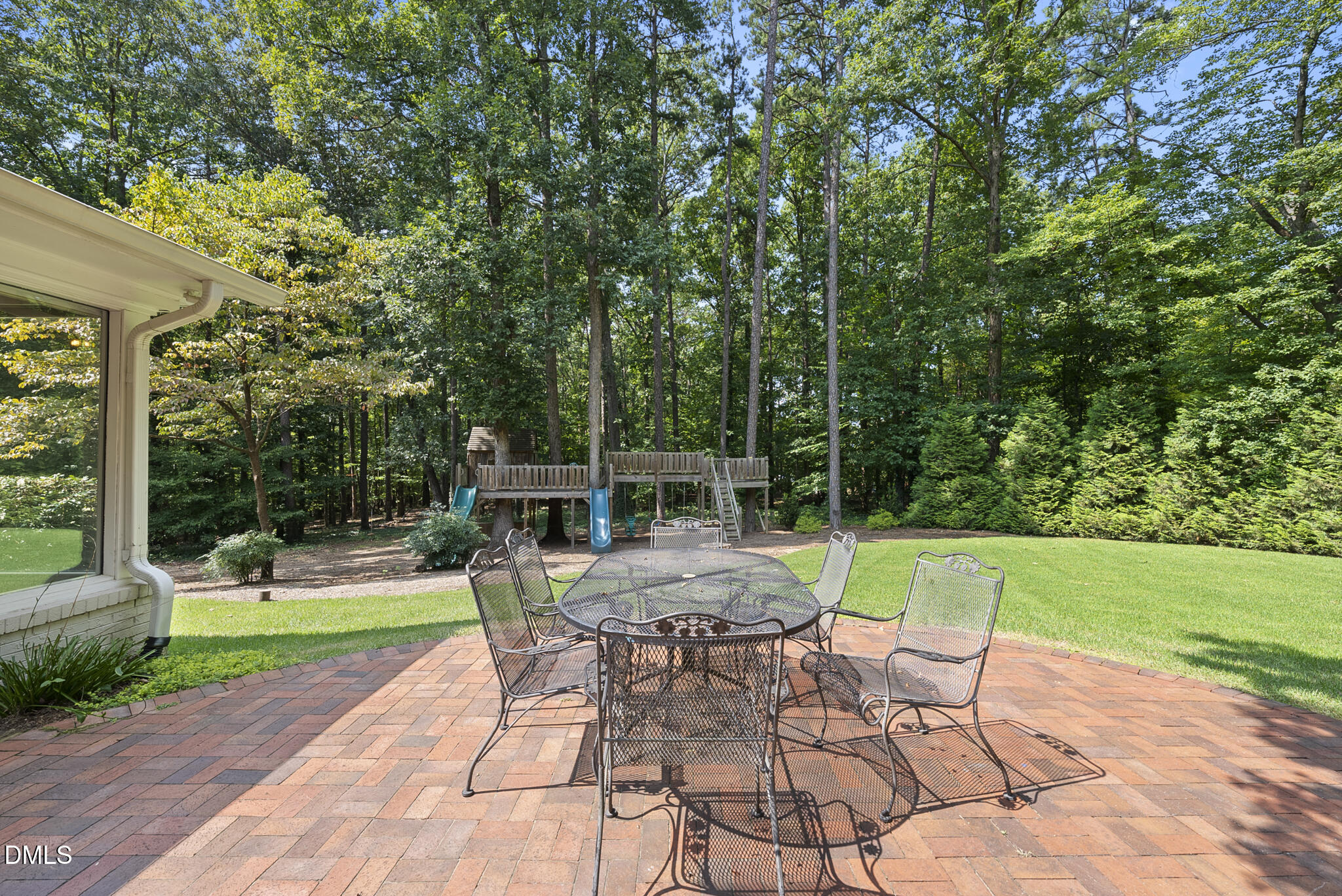 1605 Ridge Road Raleigh, NC 27607 - Photo 8 of 34 a view of a chair and table in the garden