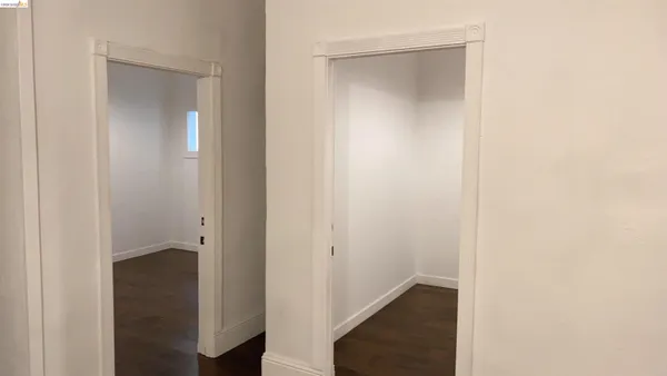 a view of a hallway with closet