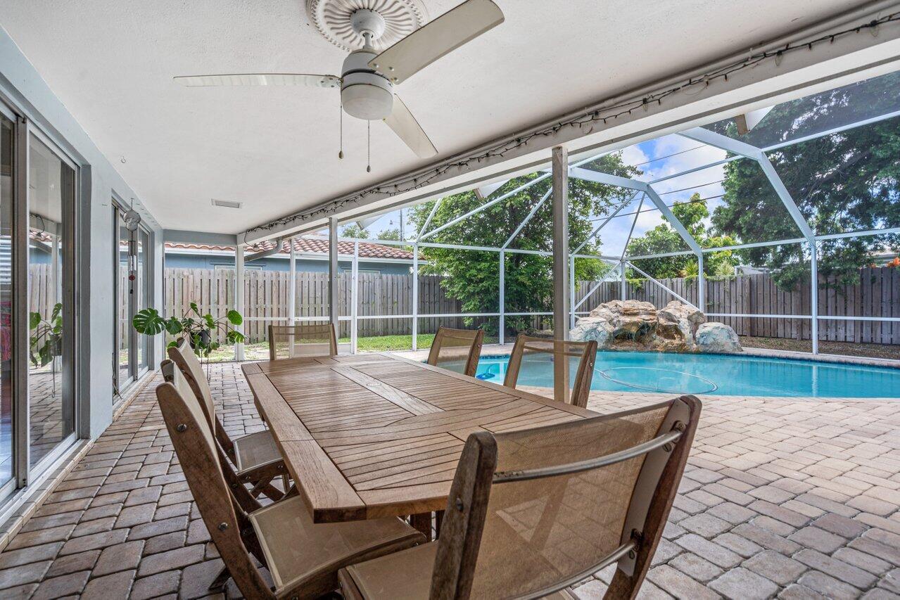 105 Orchard Ridge Lane Boca Raton, FL 33431 - Photo 4 of 37 a view of a patio with a yard