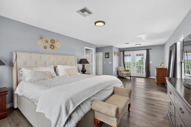 a aerial view of a house with a yard