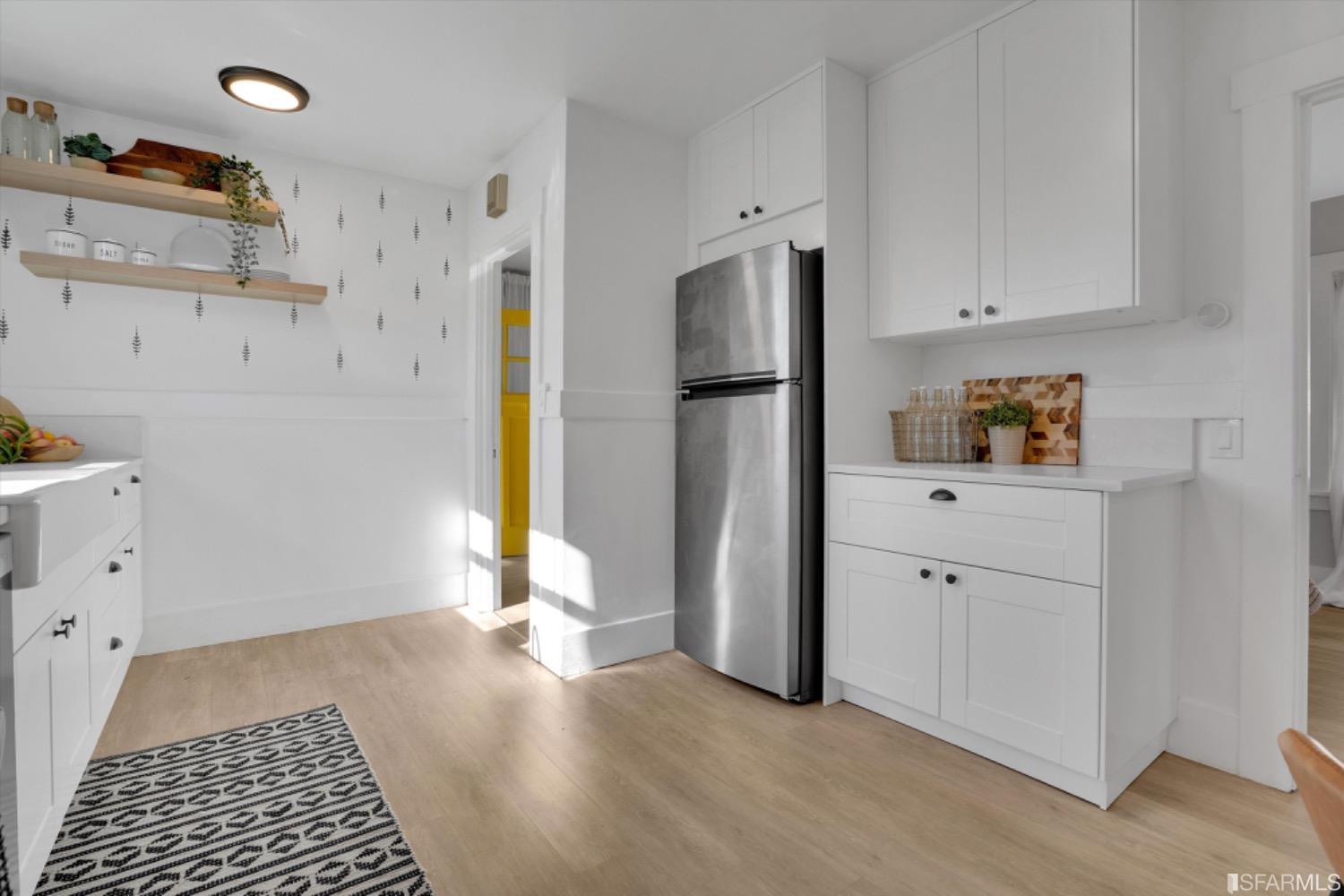 1921 Seventh Street Berkeley, CA 94710 - Photo 15 of 37 a view of a kitchen with refrigerator and window