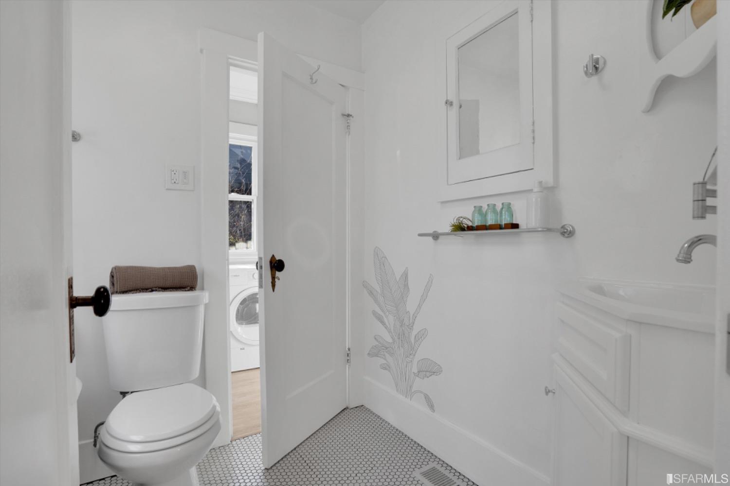 1921 Seventh Street Berkeley, CA 94710 - Photo 19 of 37 a bathroom with a toilet and a shower