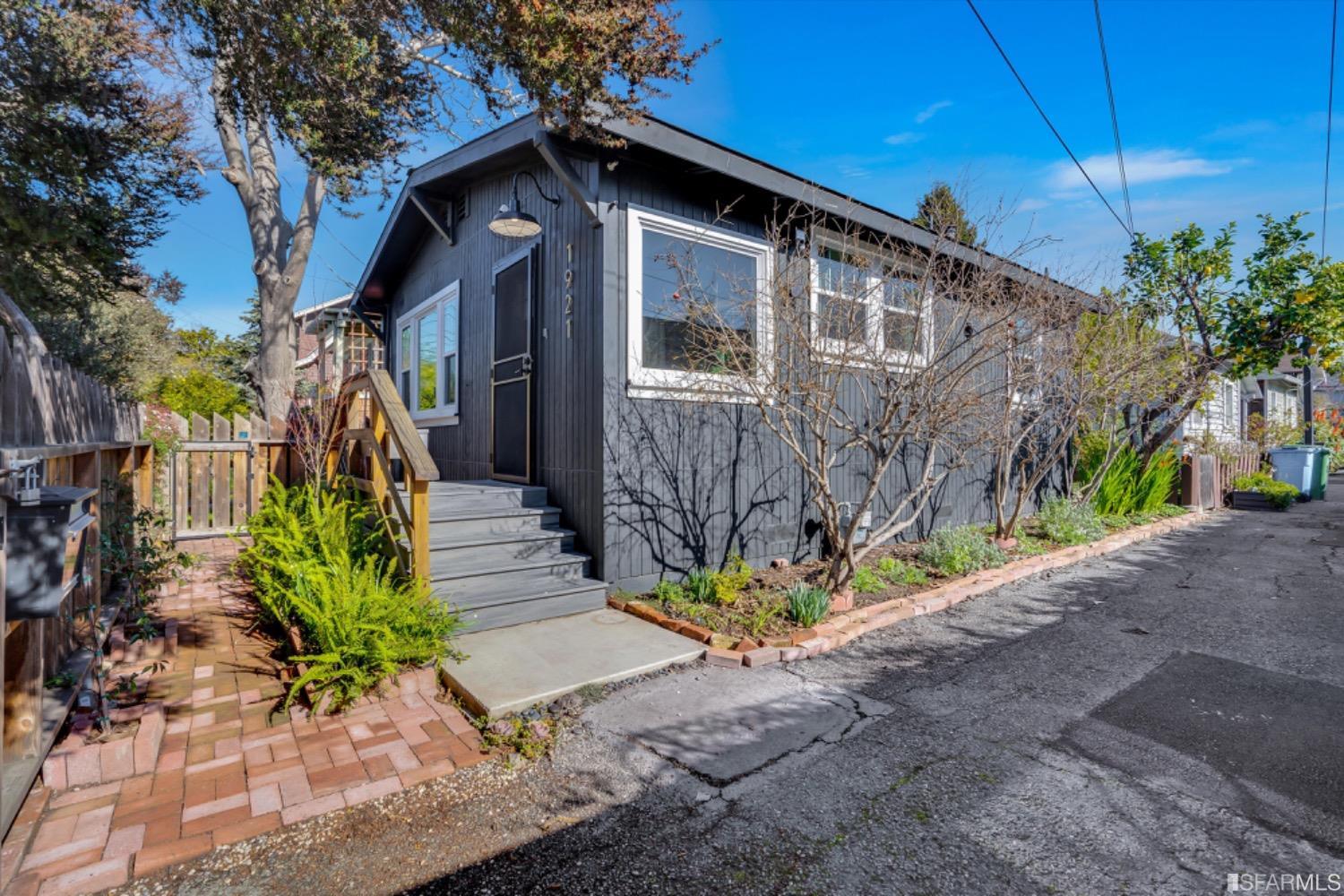 1921 Seventh Street Berkeley, CA 94710 - Photo 2 of 37 a front view of a house with a yard