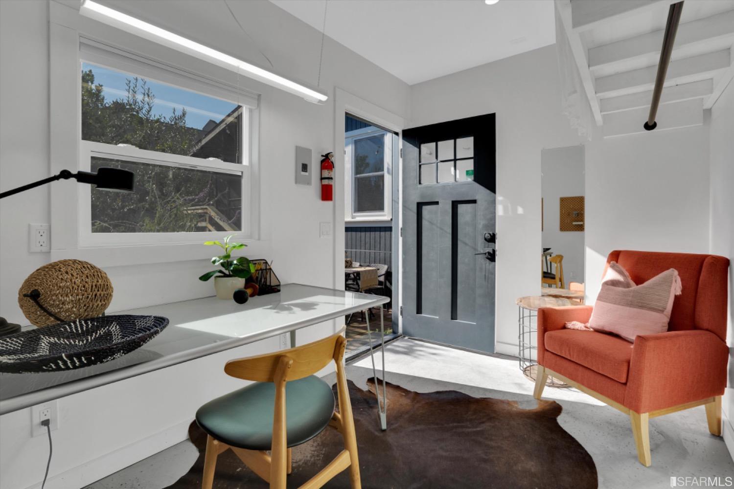 1921 Seventh Street Berkeley, CA 94710 - Photo 25 of 37 a living room with furniture and wooden floor