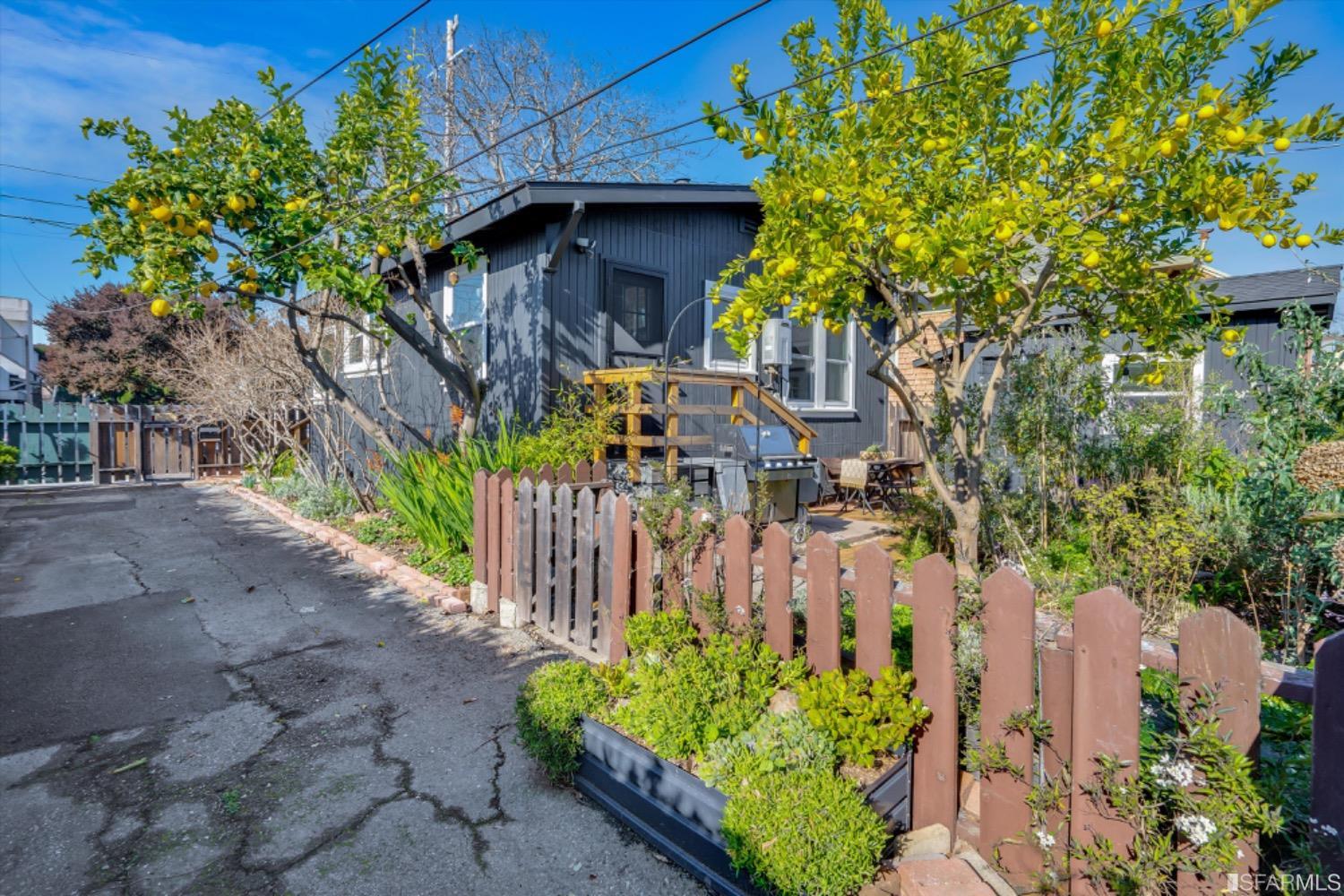 1921 Seventh Street Berkeley, CA 94710 - Photo 28 of 37 a front view of a house with a tree