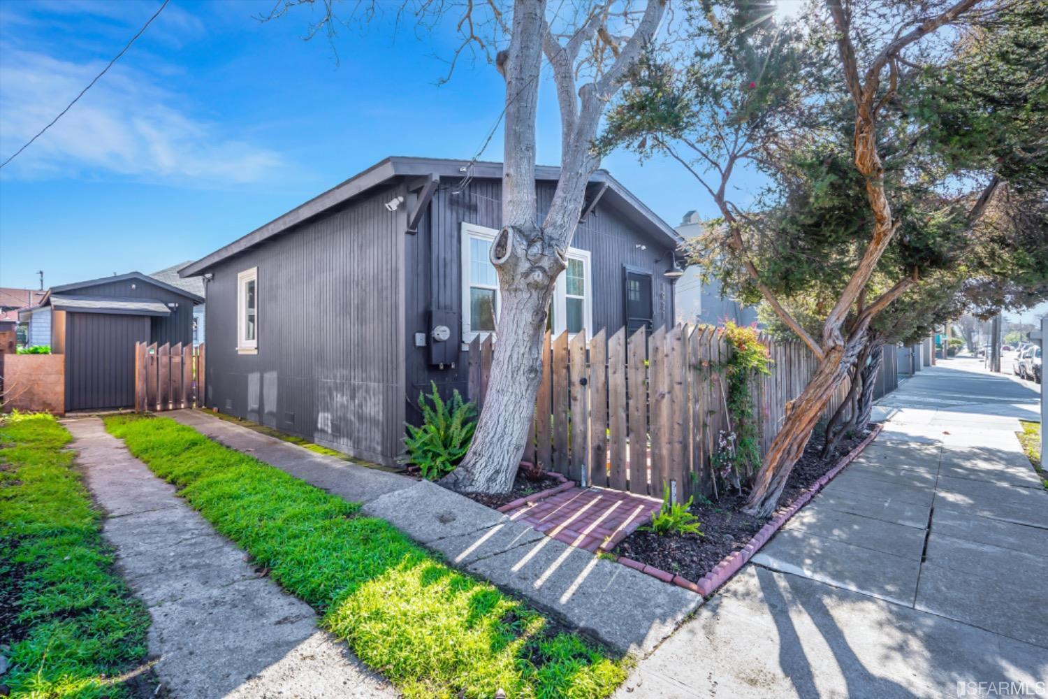 1921 Seventh Street Berkeley, CA 94710 - Photo 3 of 37 a front view of a house with garden