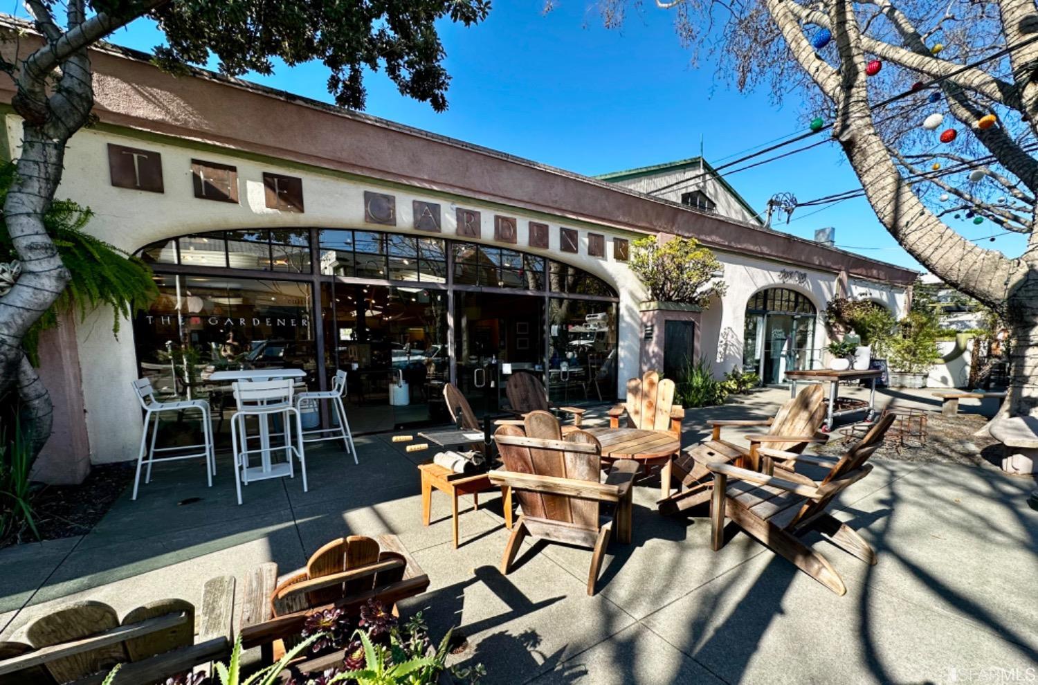 1921 Seventh Street Berkeley, CA 94710 - Photo 33 of 37 a view of a patio with table and chairs and potted plants