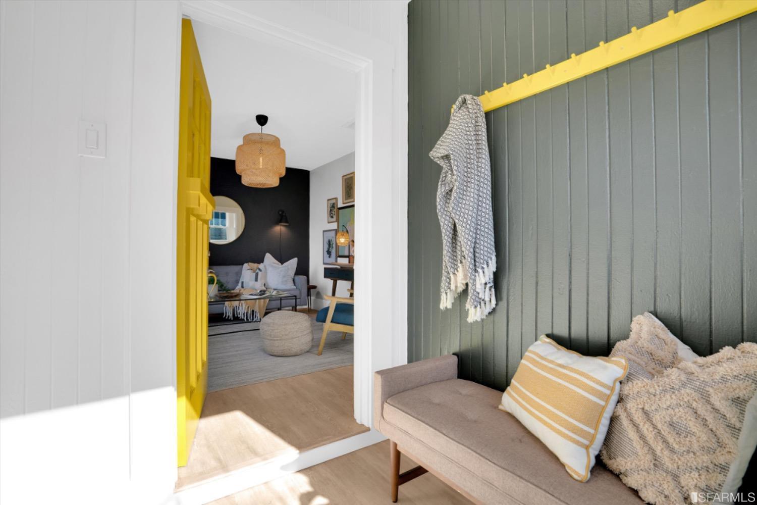 1921 Seventh Street Berkeley, CA 94710 - Photo 8 of 37 a bedroom with a bed and a chandelier