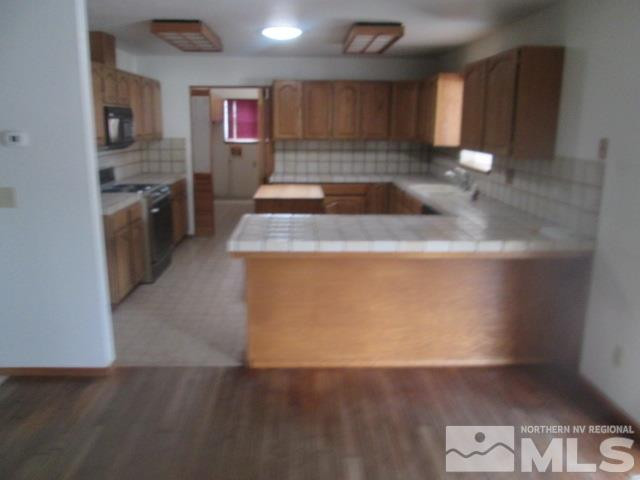 3148 Bottom Road Fallon, NV 89406 - Photo 12 of 25 a view of a kitchen with a sink