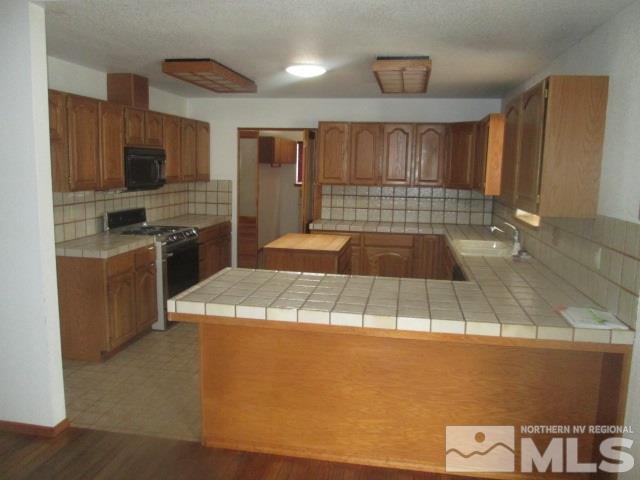3148 Bottom Road Fallon, NV 89406 - Photo 13 of 25 a room with pool table flat screen tv and windows