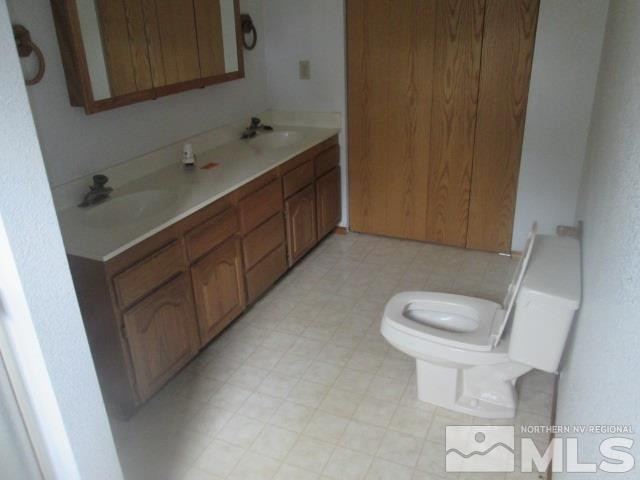 3148 Bottom Road Fallon, NV 89406 - Photo 17 of 25 a bathroom with a sink and a toilet