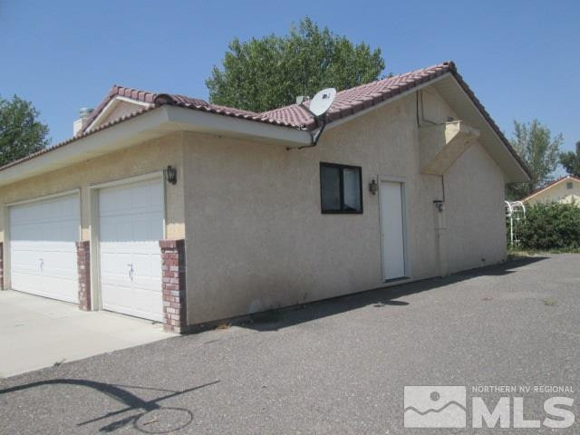 3148 Bottom Road Fallon, NV 89406 - Photo 2 of 25 a backyard of a house