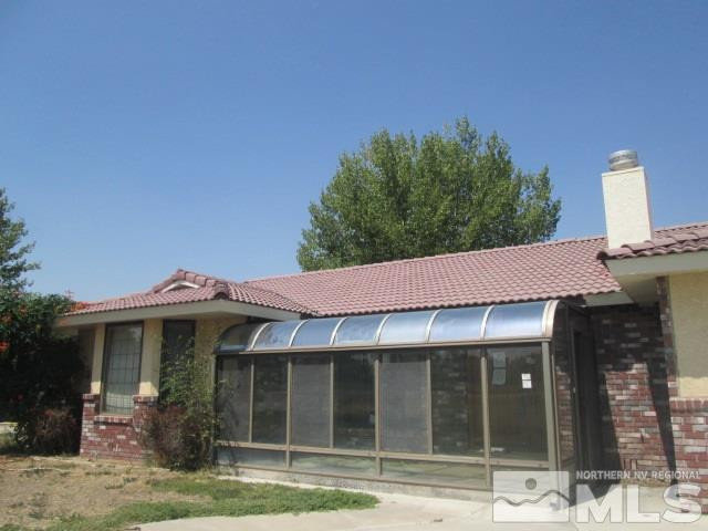 3148 Bottom Road Fallon, NV 89406 - Photo 24 of 25 a front view of a house with garden