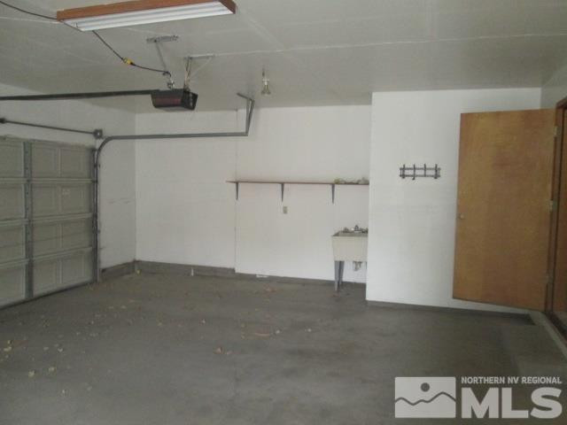 3148 Bottom Road Fallon, NV 89406 - Photo 5 of 25 a view of storage and utility room with racks on the wall