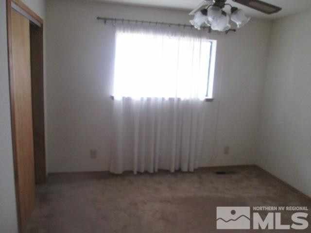 3148 Bottom Road Fallon, NV 89406 - Photo 7 of 25 an empty room with a window