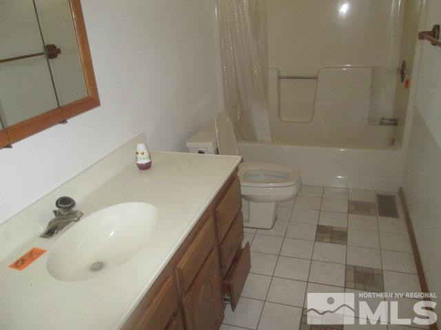 3148 Bottom Road Fallon, NV 89406 - Photo 10 of 25 a bathroom with a sink a toilet and shower